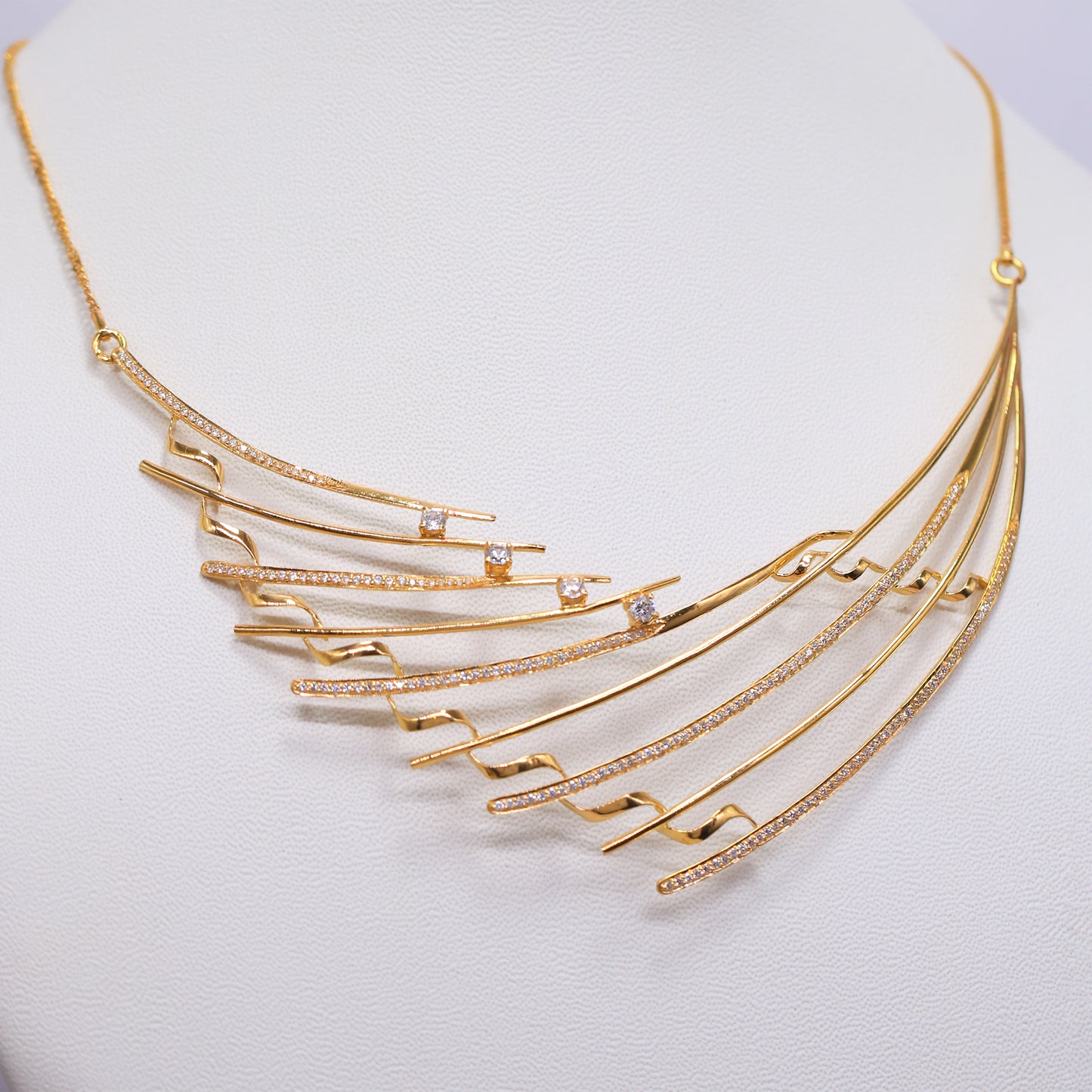 Ashadi Modern Gold Necklace – Multi-Bar Curved Statement Design